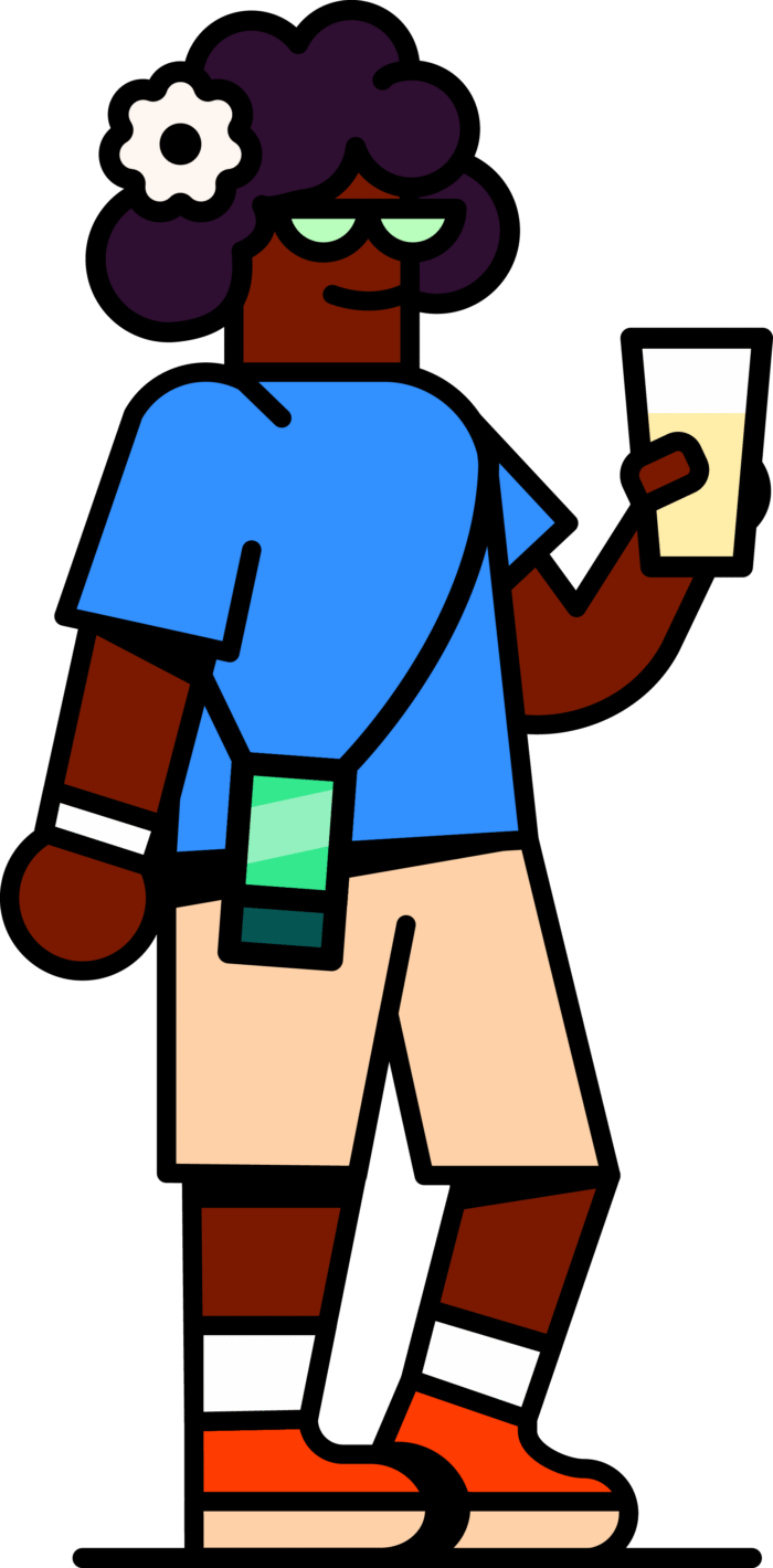 Femme avec un verre d'alcool à la main